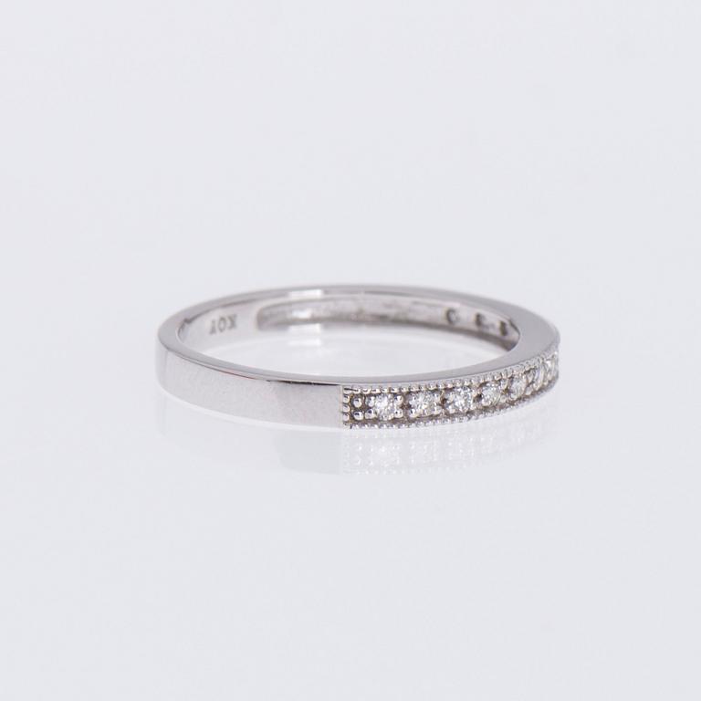 RING, briljantslipade diamanter, 14K vitguld. Suomen korutuote.