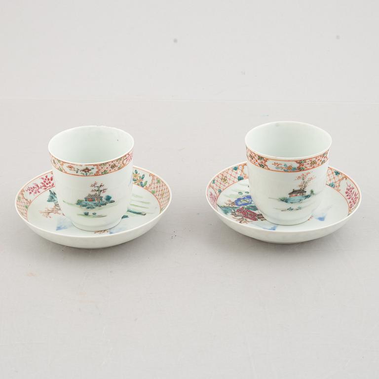 A Pair of Famille Rose export porcelain cups with saucers, China, Qianlong (1736-95).