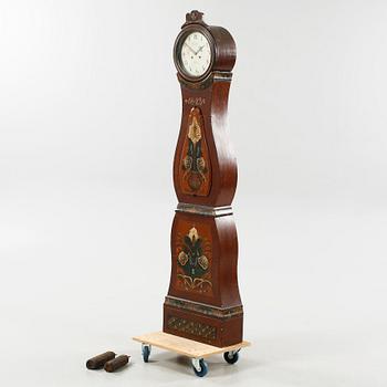 A grandfather clock dated 1823.