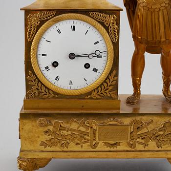 An empire mantel clock, first half of the 19th century.