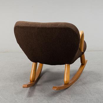 A mid 20th century rocking chair, Muslingestolen, attributed to Philip Arctander.