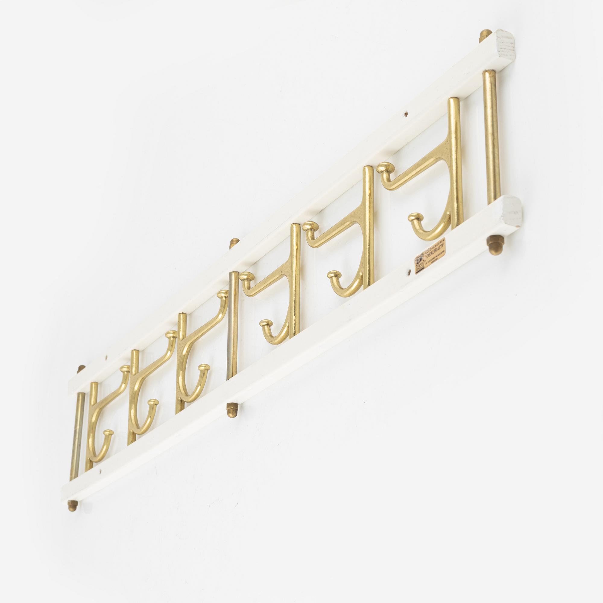A 'Dekorativ' coat hanger, Skogslunds Metallgjuteri,  Anderstorp, 1950's/60's.