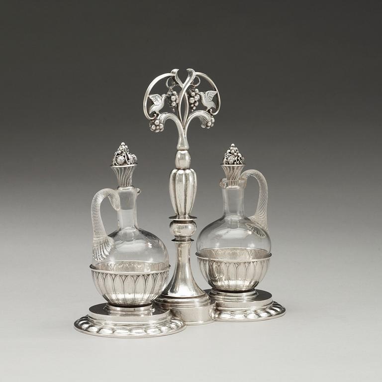 A Georg Jensen 830/1000 silver cruet-stand, Copenhagen 1921.