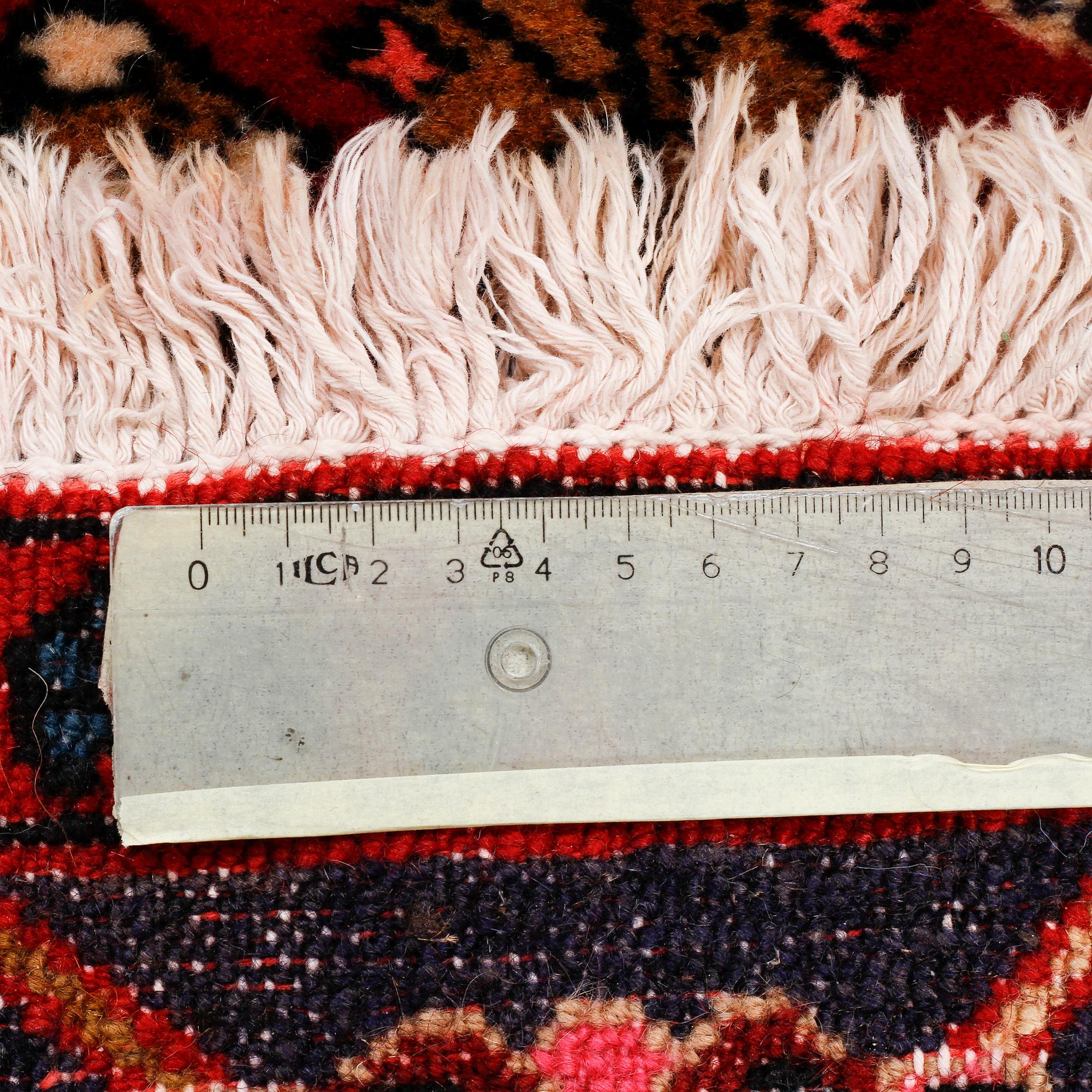 A north west persian rug, 240 x 150 cm.