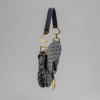 CHRISTIAN DIOR, a vintage mpnpgram canvas 'Saddle Bag!.