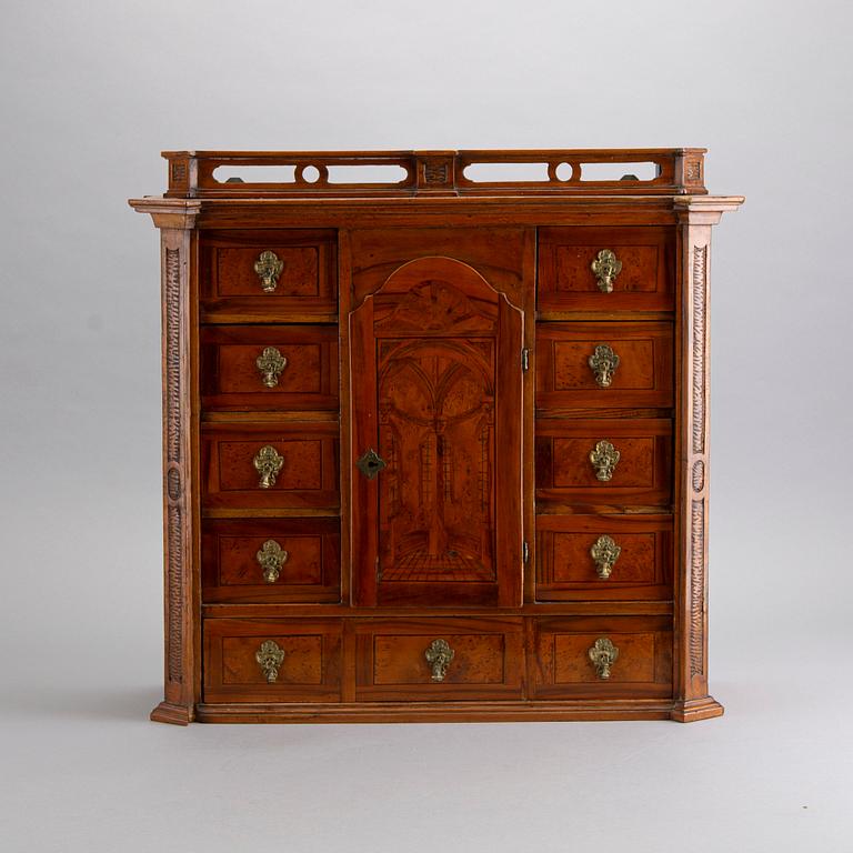 An 18/19th century cabinet, according to information Prague, Czech Republic.