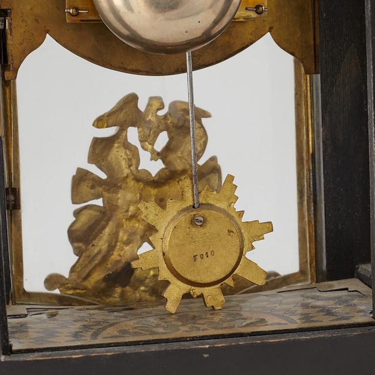 A boulle style table clock, circa 1900.