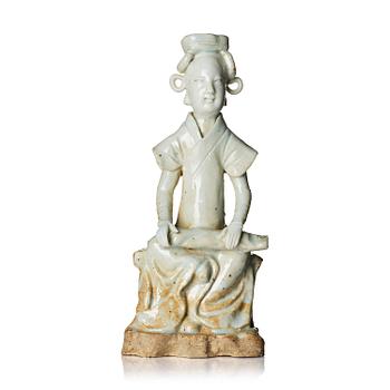 999. A white glazed sculpture, Yuan/Ming dynasty.