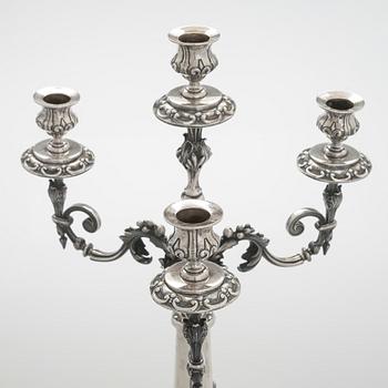 A pair of silver candelabra, maker marks of Carl Johan Tegelsten, Saint Petersburg 1850.