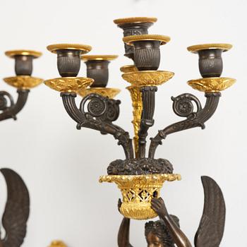 A pair of French Empire five-branch gilt and patinated bronze appliques, first part 19th century.