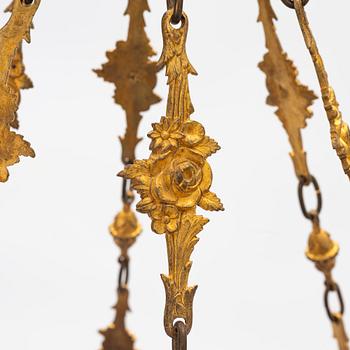 A gilt bronze sixteen-light Empire-style chandelier, later part of the 19th century.