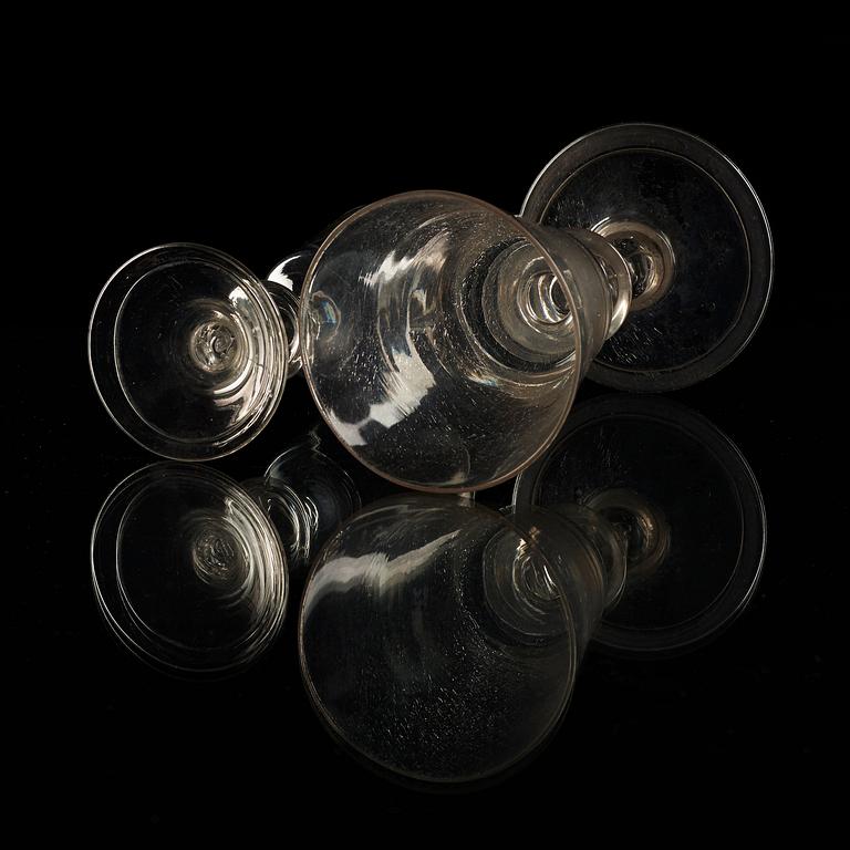 A set of 16 wine glasses and 11 smaller wine glasses, the latter part of 18th Century.