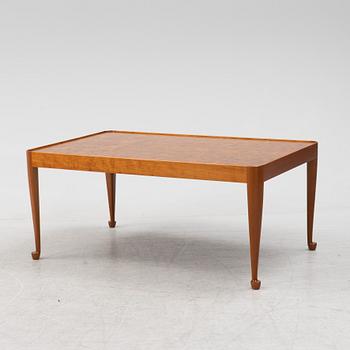 A Josef Frank mahogany and elm root model 2073 coffee table, designed 1949.