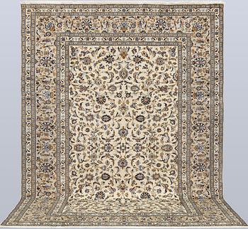 A Keshan carpet, 345 x 246 cm.