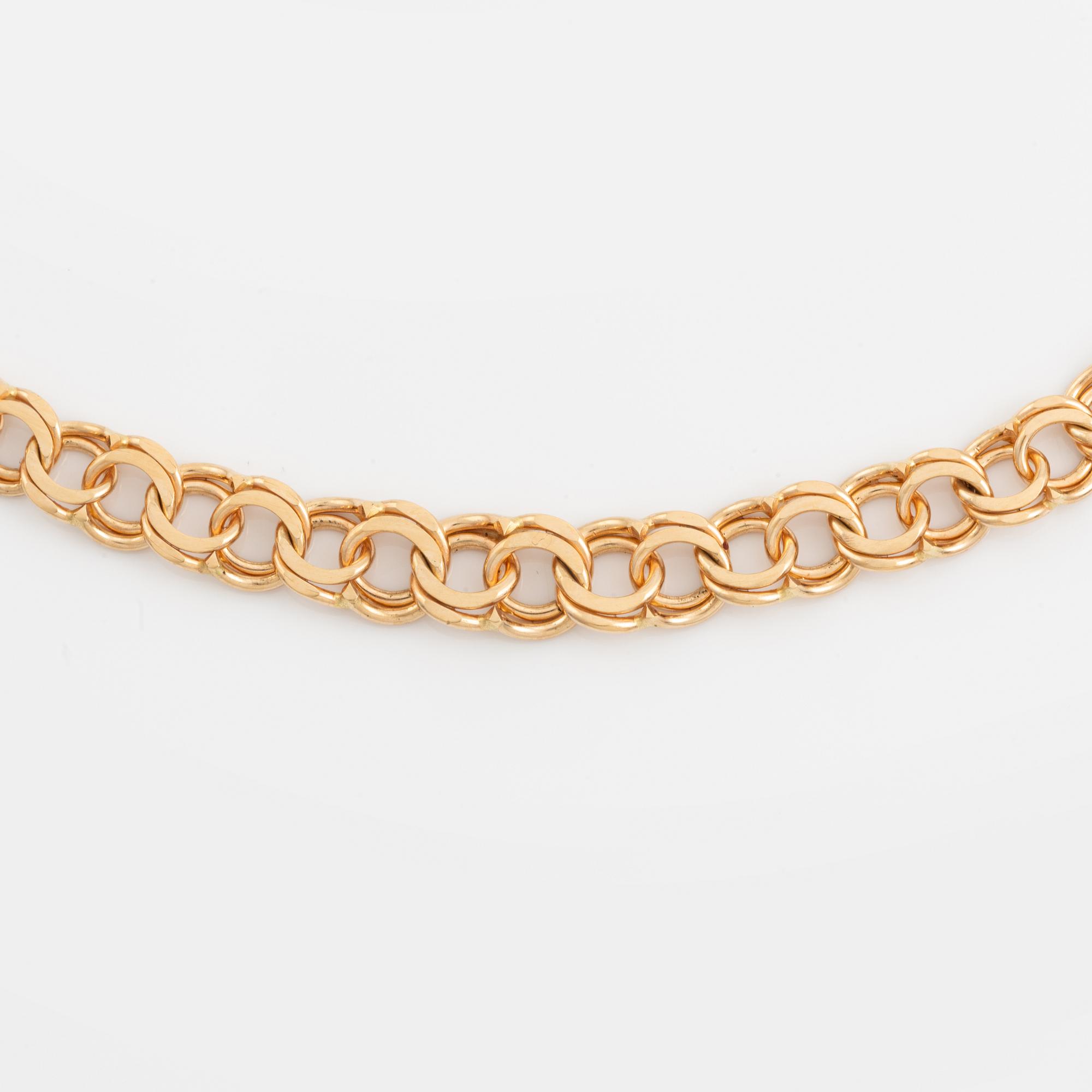 Collier 18K guld, doserad bismarck, med berlock.