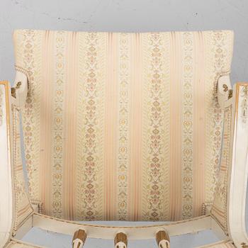 A pair of chairs and an armchair, late Gustavian style, early 20th century.