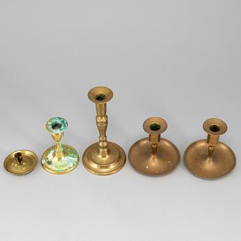Five brass candlesticks, 18th/19th century.