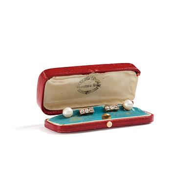 539. A pair of jewelled, pearl and gold Imperial presentation cufflinks by Constantine Nicholls Ewing, St Petersburg ,