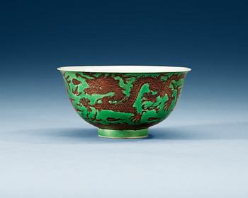 A green and aubergine glazed dragon bowl, Qing dynasty, with Kangxis six character mark and period (1662-1722).