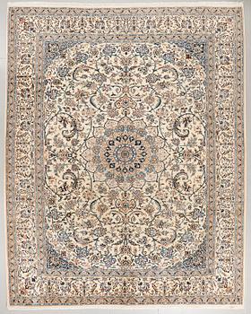 A Nain rug, part silk, 382 x 301 cm.