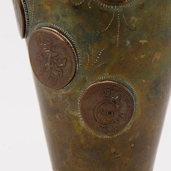 A late 19th Century brass cup.