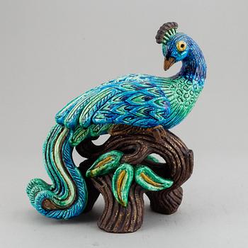 GUNNAR NYLUND, a stoneware figurine of a peacock, Rörstrand.