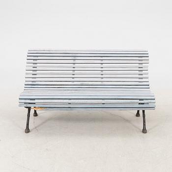 A cast iron early 1900s garden sofa.