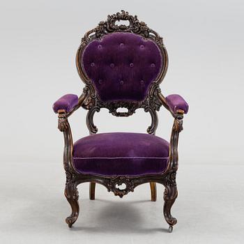 a rococo-style armchair from the second half of the 19th century.