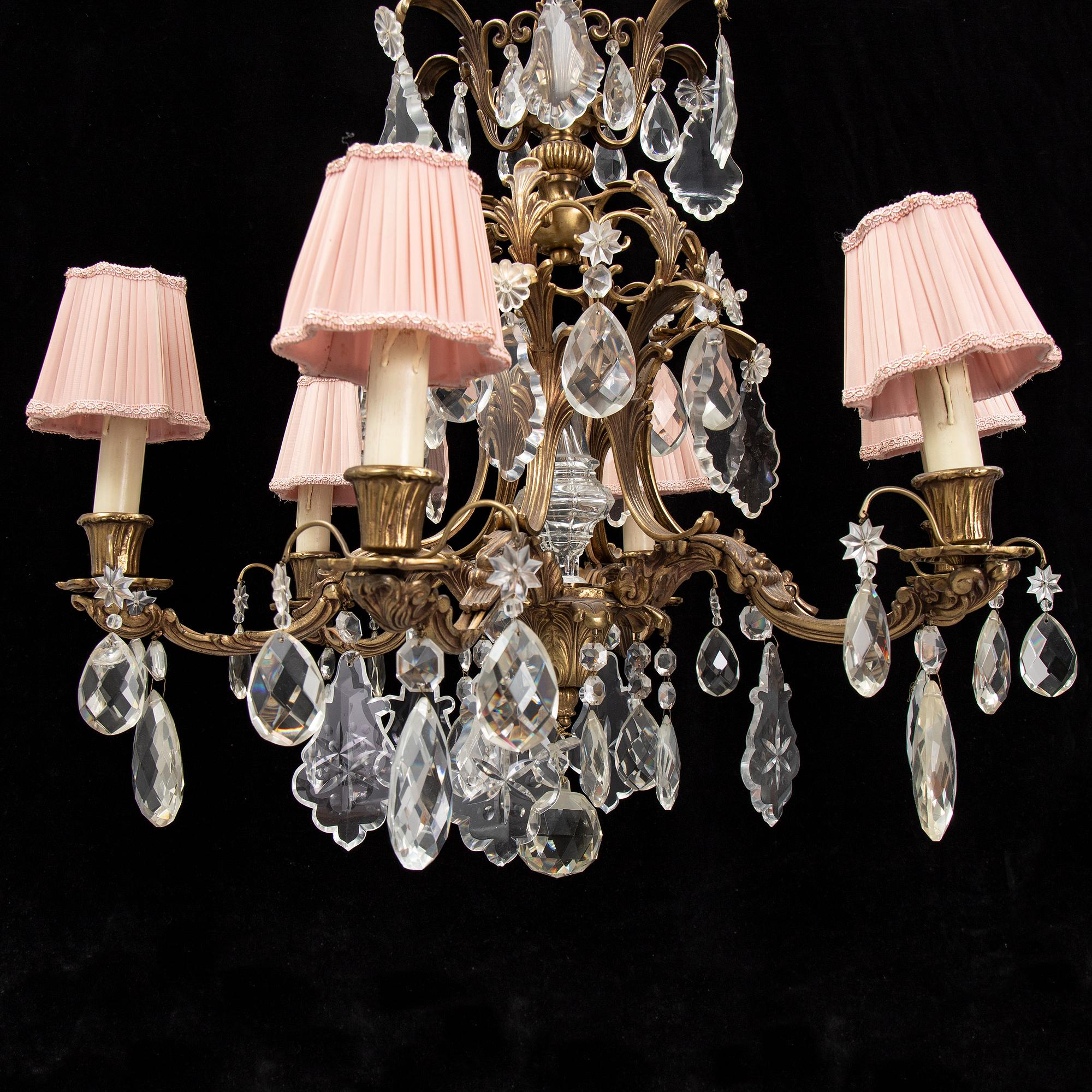 A brass and glass chandelier.