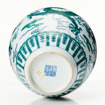 A green-enamelled 'five clawed dragon' jar, Qing dynasty, seal mark and period of Qianlong (1736-1795).