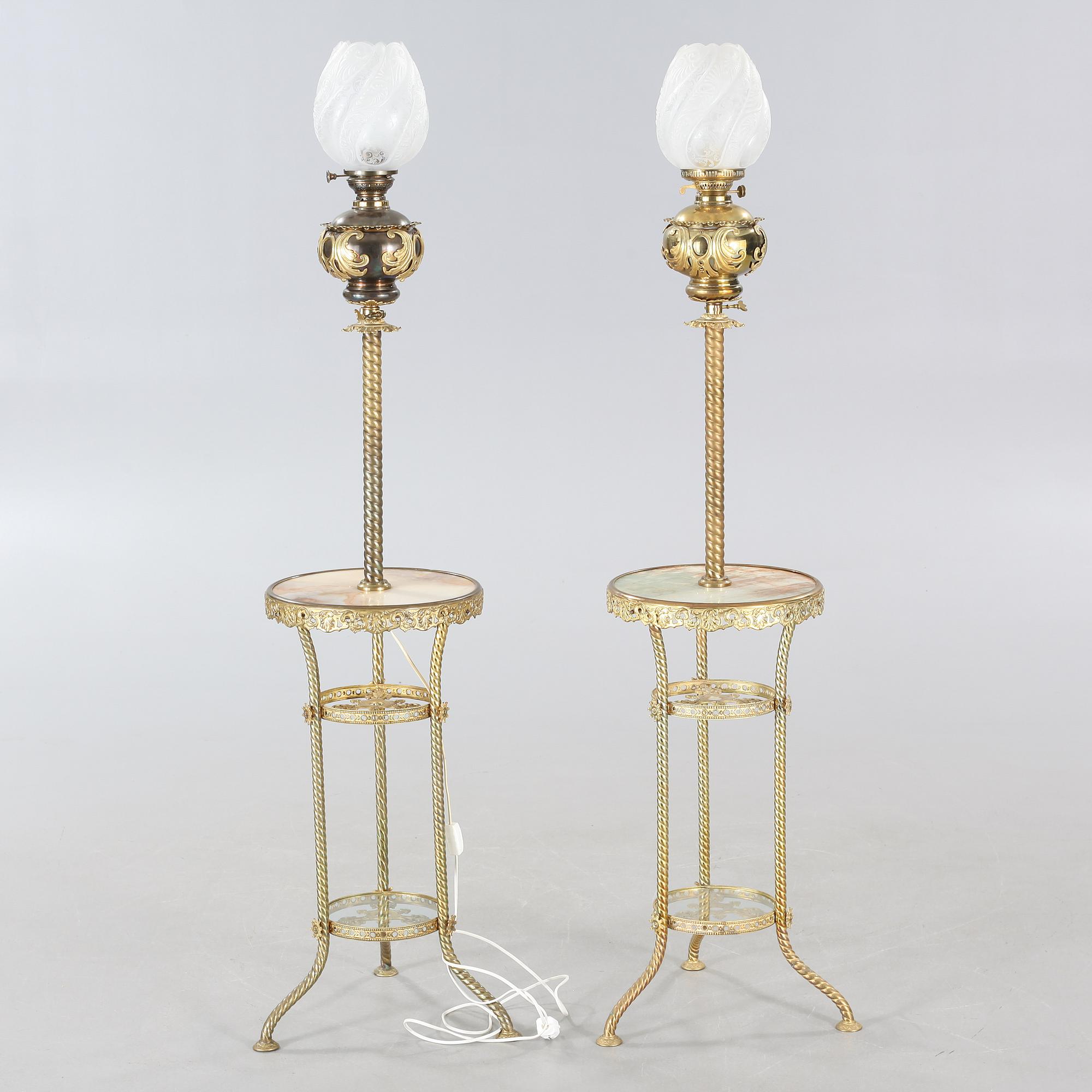 Two floor parafine lamps, 20th century.