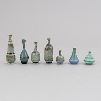 A set of 21 stoneware miniature vases and a bowl, including Höganäs.