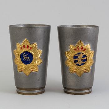 2 pewter beakers by Firma Svenskt Tenn" dated 1930.