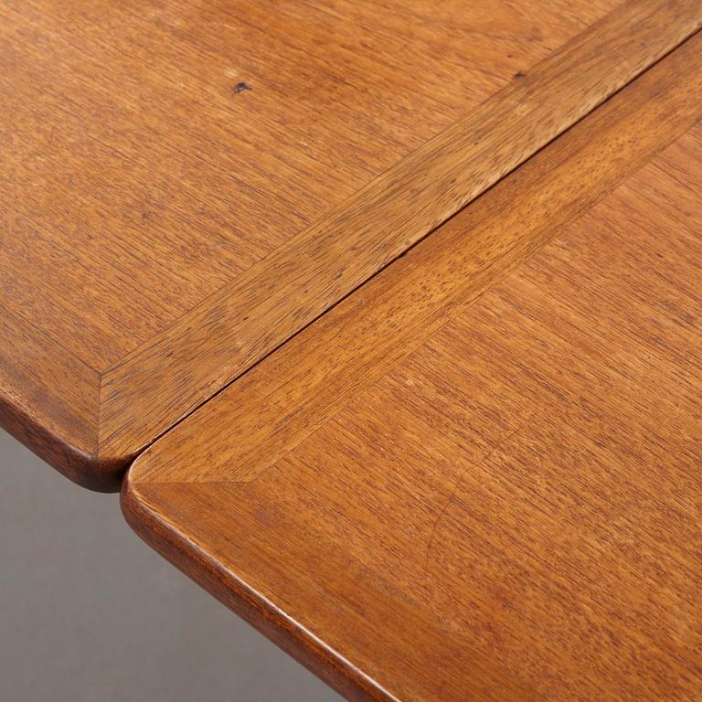 Hans J. Wegner, a teak and beech dinner table by Andreas Tuck, Denmark 1950-60's.