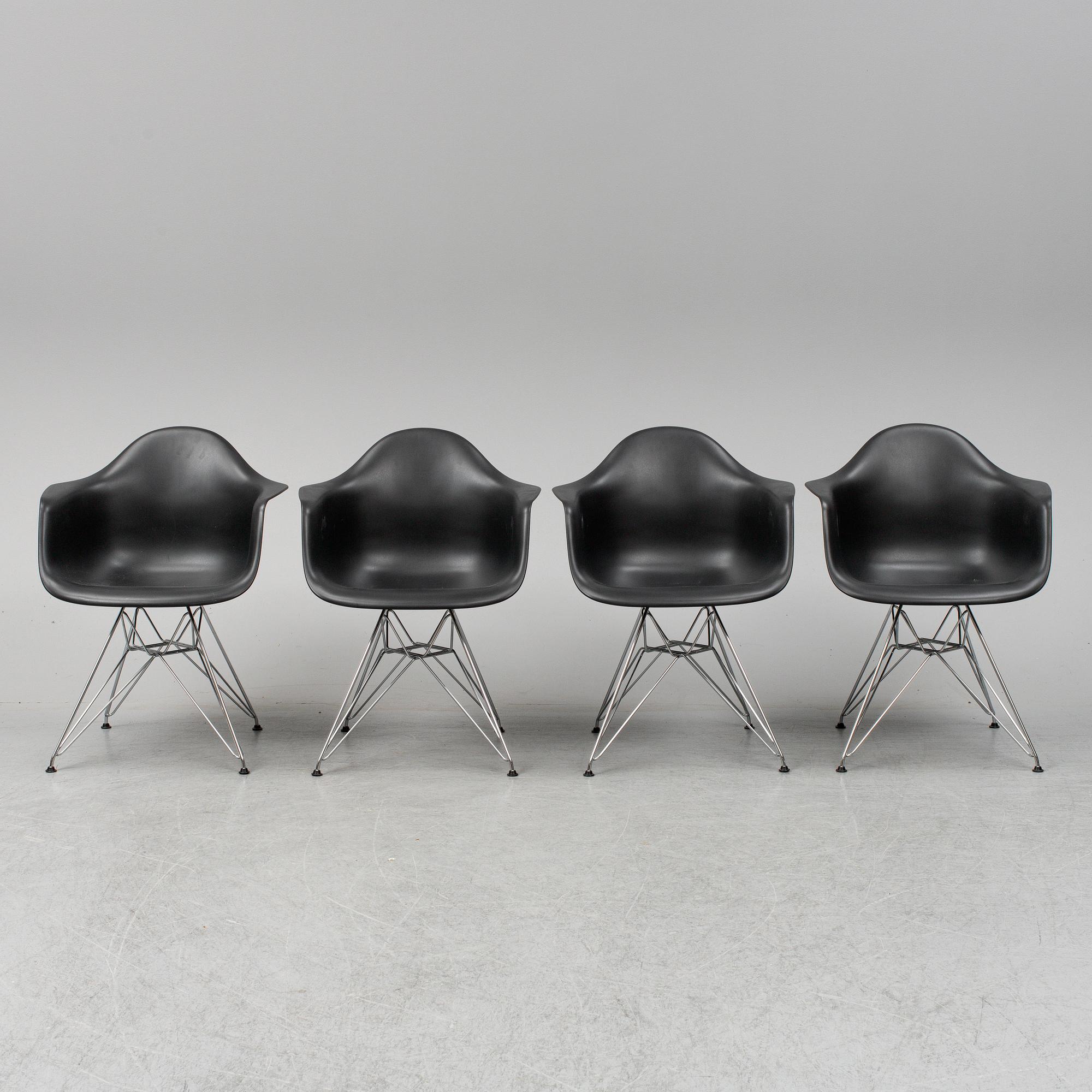 CHARLES AND RAY EAMES,  4  Eames Plastic Armchair, Vitra 2010.
