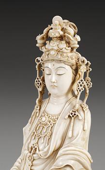 A Japanese ivory figure of Guanyin, probably Meiji period (1868-1912). Signed.