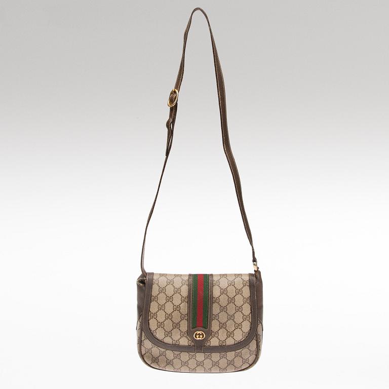 LAUKKU, Gucci.