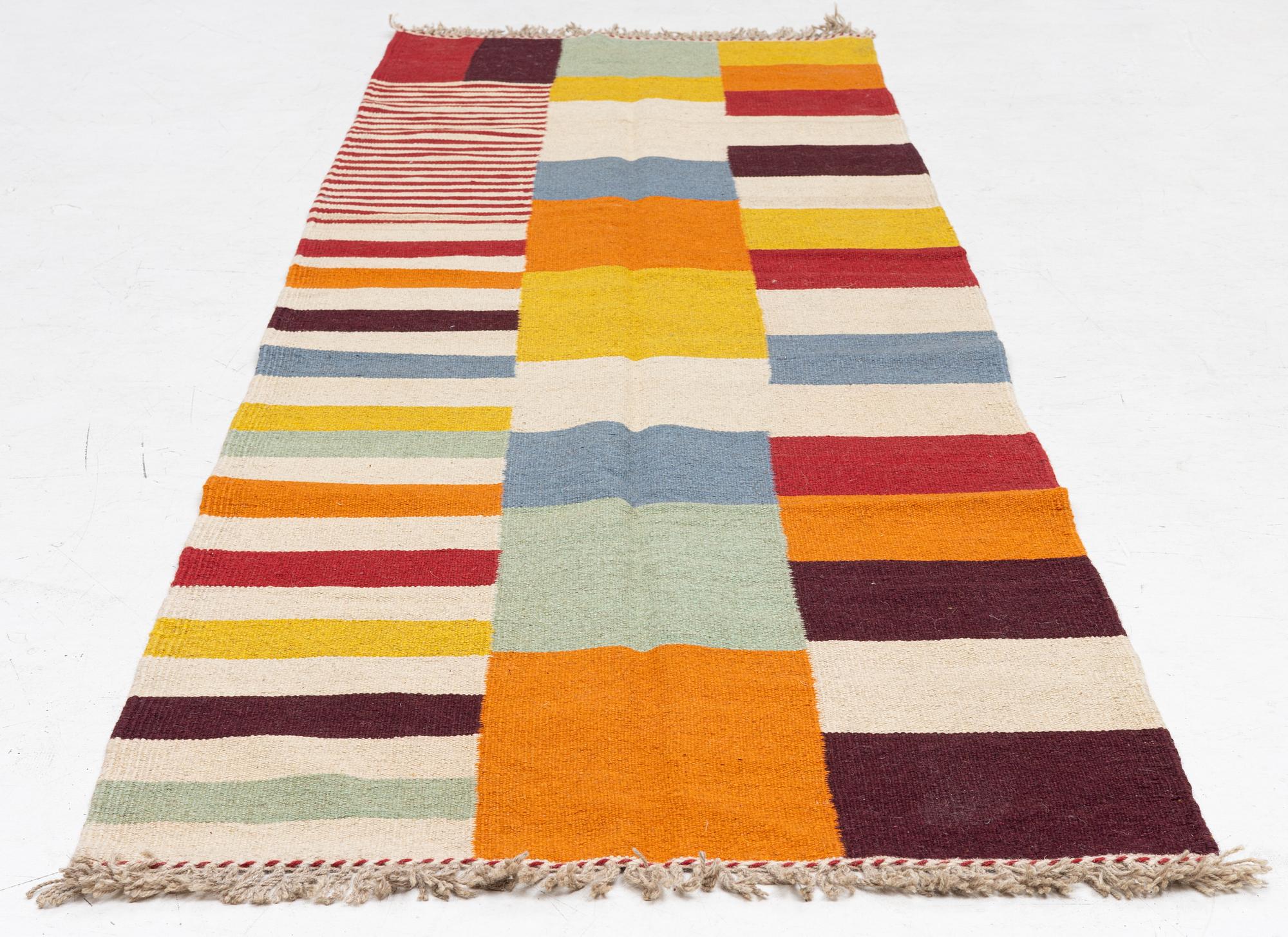 A Kilim runner, c. 297 x 85 cm.