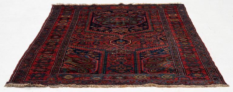 An antique Northwest Persian rug, c. 179 x 143 cm.