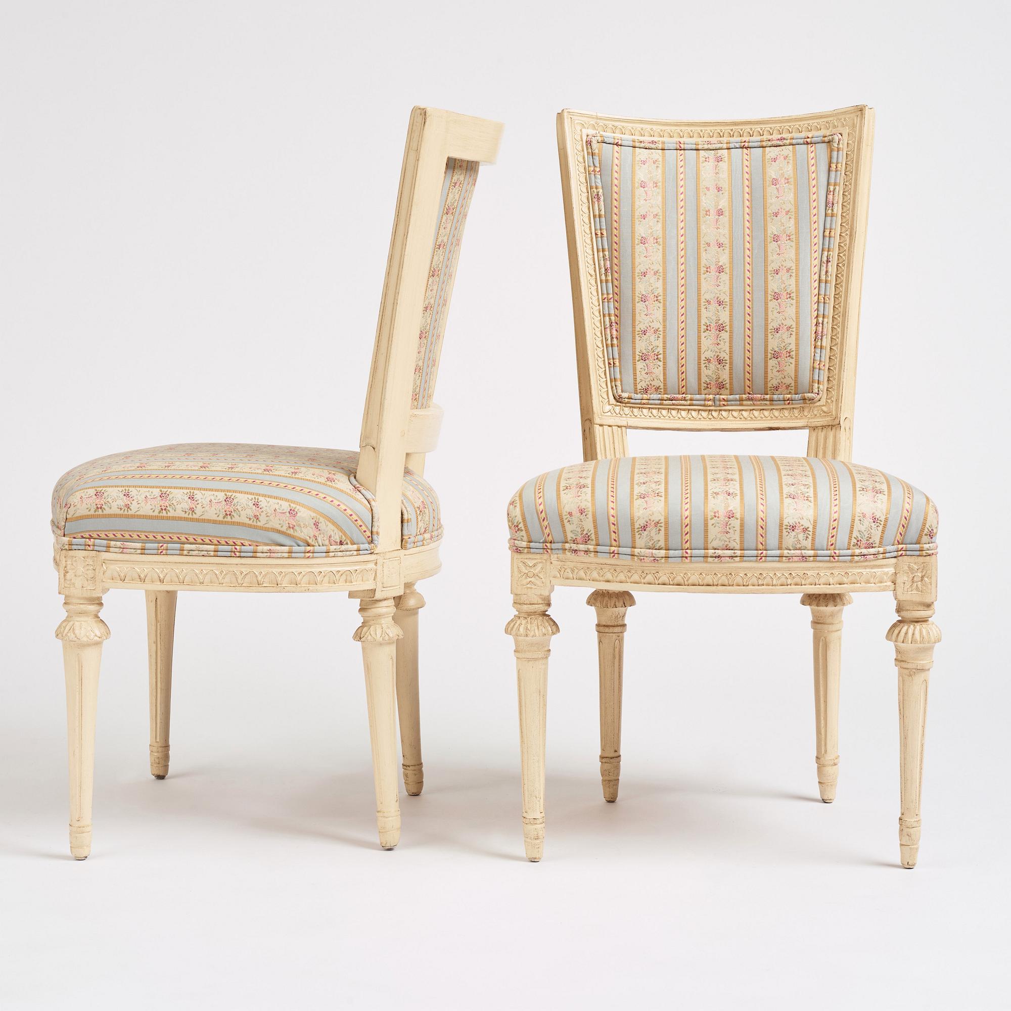 A set of nine Gustavian chairs by A Hellman (master in Stockholm 1761-94) and E Ståhl (master in Stockholm 1794-1820).