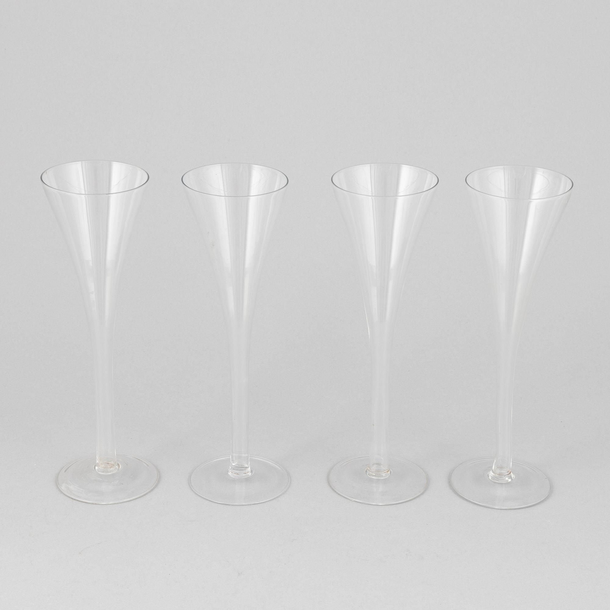 A set of four 19th century champagne flutes.