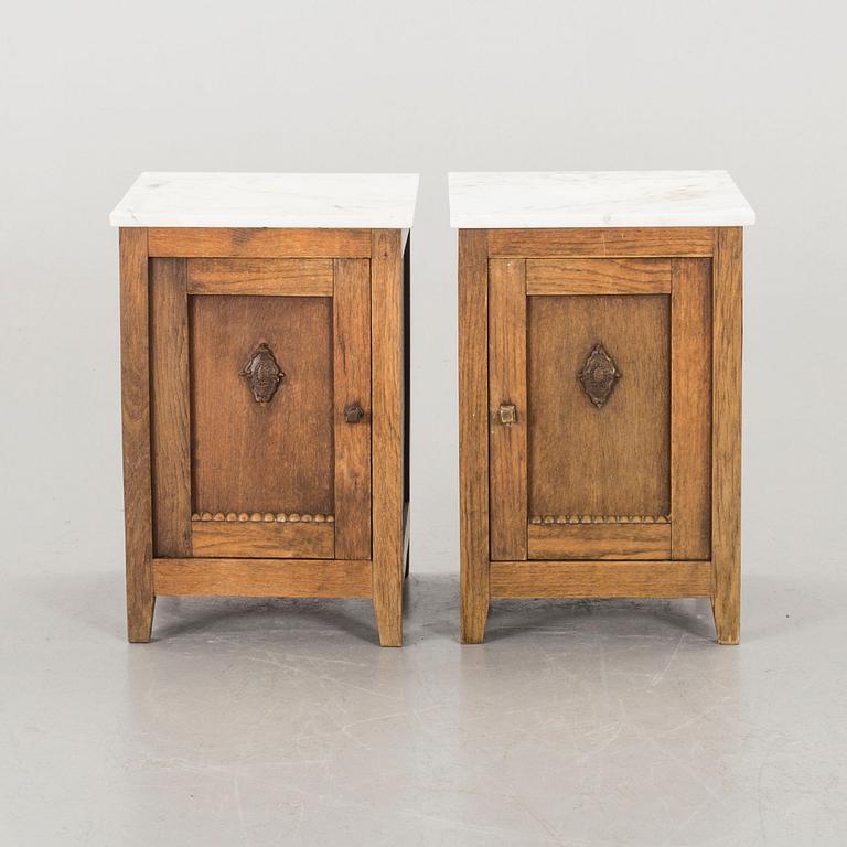 A PAIR OF BEDSIDE TABLES.