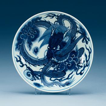 A blue and white dragon dish, Qing dynasty with Yongzheng six character mark.