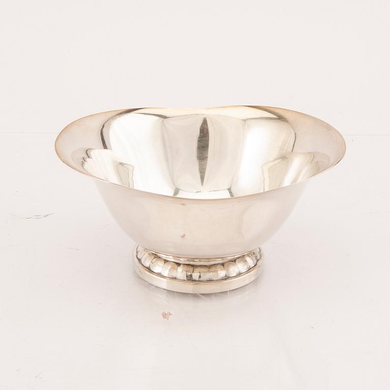 A set of five silver vases and bowls 20th century.