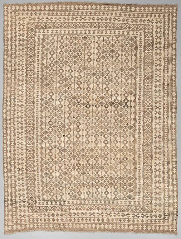 An oriental Kilim, ca 345 x 260 cm.