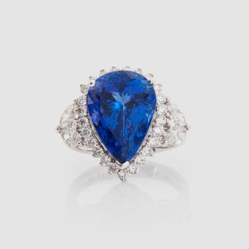 1364. A tanzanite, 8.23 cts, and diamond, 1.31 cts, ring.