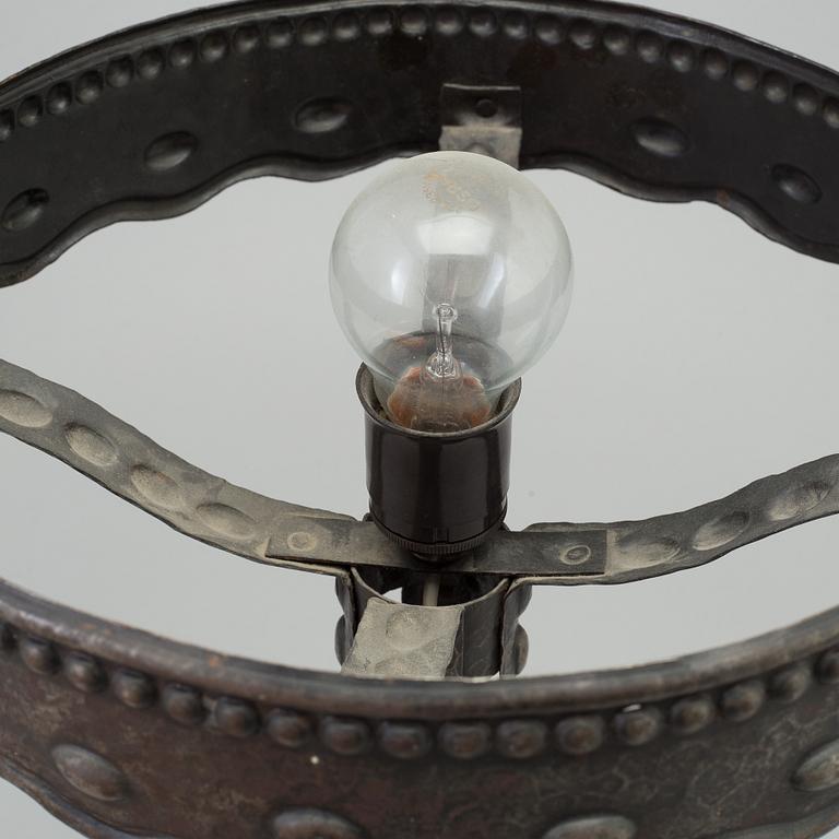 A early 20th century metal table light.