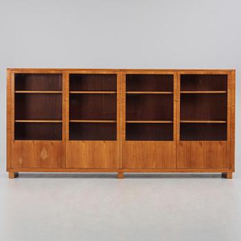 Carl Malmsten, a walnut bookcase, Sweden, 1930s.