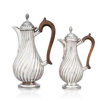 211. A Victorian silver coffee pot and a milk pot, Martin Hall & Co Ltd, London 1878 and Charles Stuart Harris, London 1877.