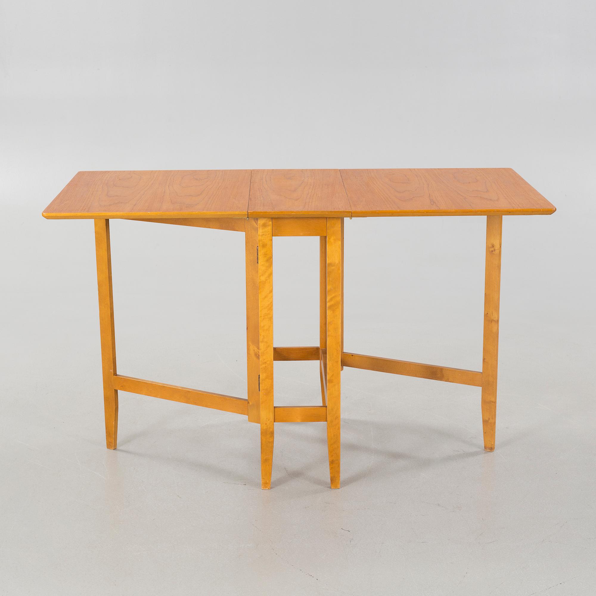 A gate-legged table by Edsbyverken in 1959.